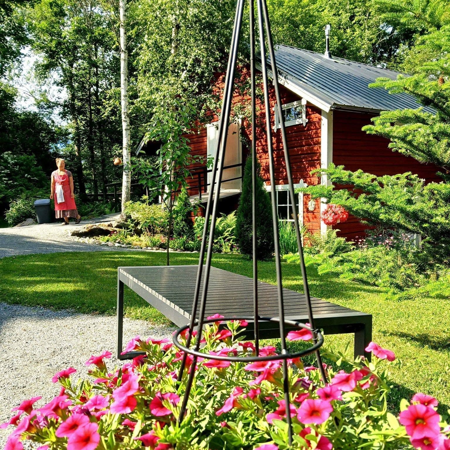 The mill yard and flowers in summer